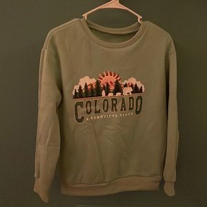 Light green crewneck,size m, never worn.